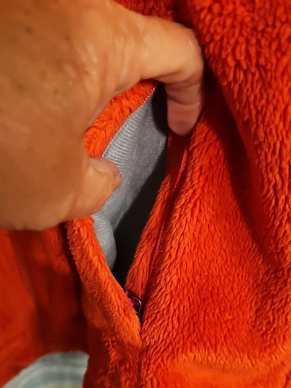 The North Face Girl's Bright Orange Plush Full-Zip Jacket with Purple Accents